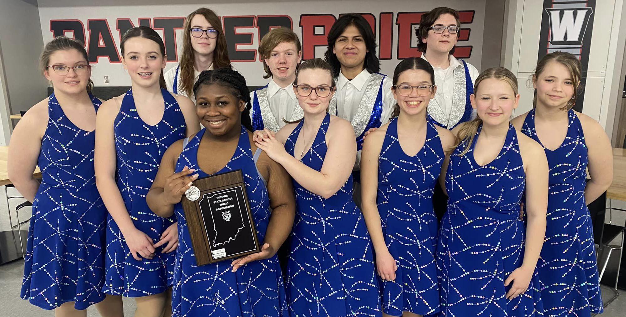 The Marion High School Innovations show choir poses with their Silver award at the ISSMA Jazz Competition in March 2024